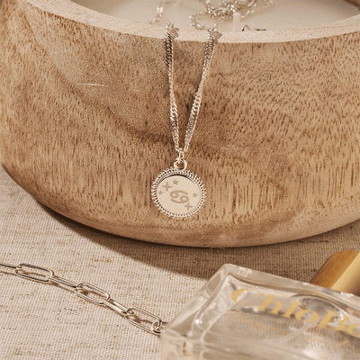 925 sterling silver moon coin necklace, engraved with the Cancer zodiac symbol