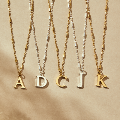 Range of initial necklaces in both 925 sterling silver and 18ct gold plating. Initials A, C, D, K and J are shown